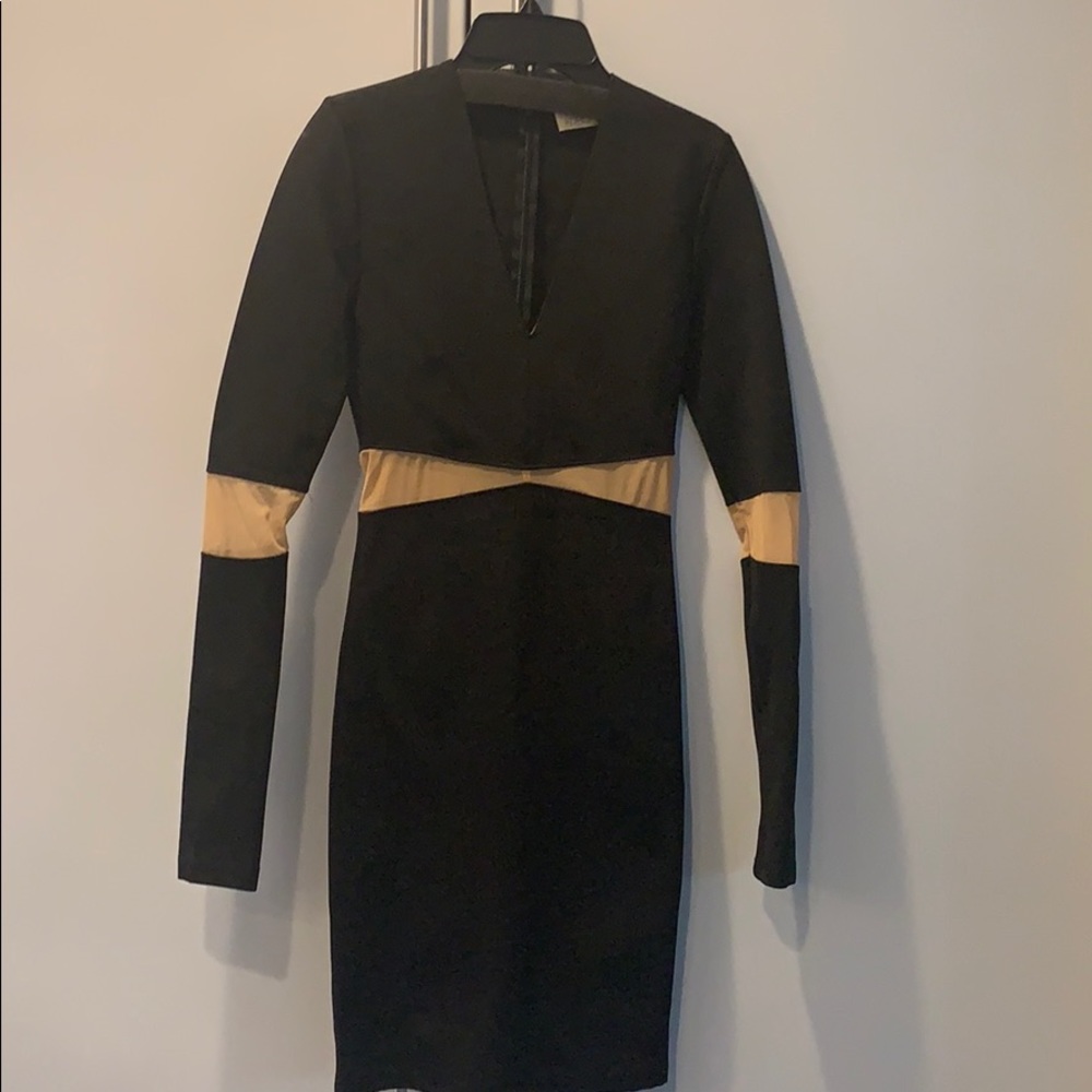 Black mini dress with nude sheer detail